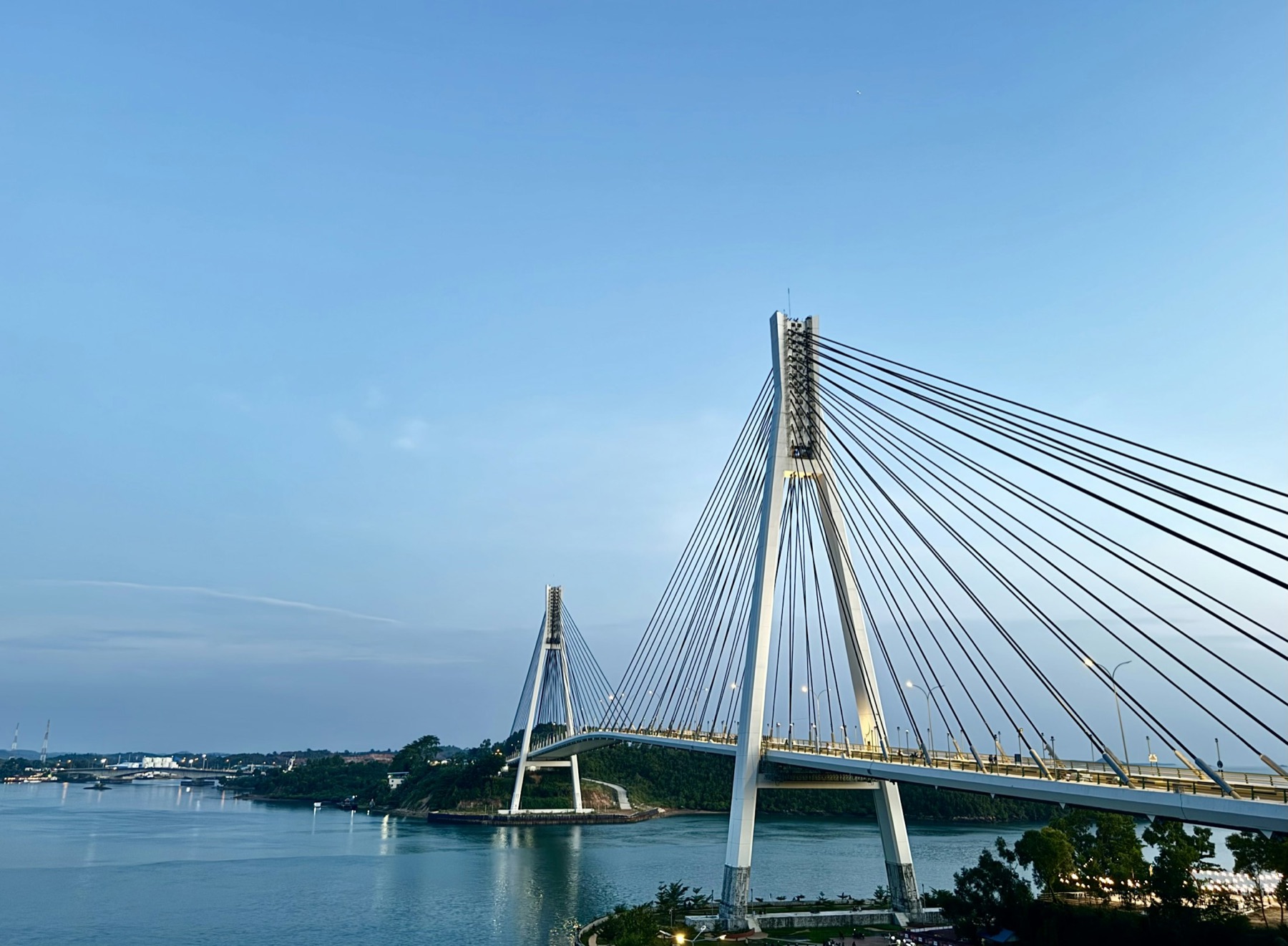 The cable-stayed Barelang Bridge stretching over blue water under a clear sky — the icon of Batam.